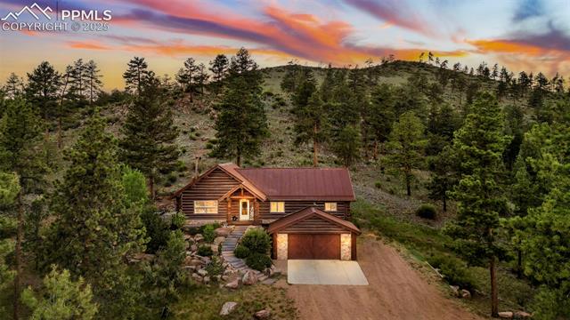 35 Toms Ranch Rd Lake Lake George, CO 80827 - Photo 43 of 50 Birds eye view of front of home at dusk