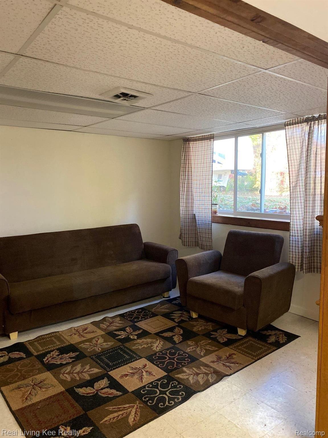 3849 Williams Road Columbiaville, MI 48421 - Photo 20 of 27 Basement Living room.jpg
