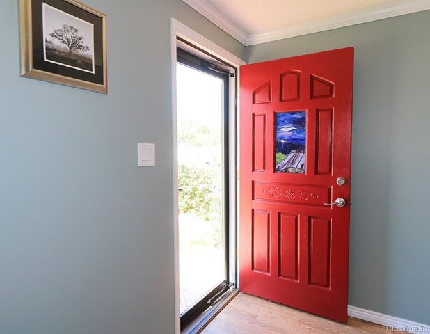 a view of front door with a hallway