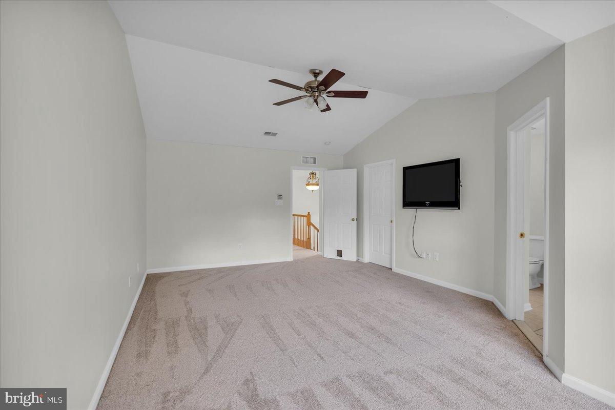 27 Golf View Court Pine Hill, NJ 08021 - Photo 12 of 33 a view of empty room with wooden floor and ceiling fan