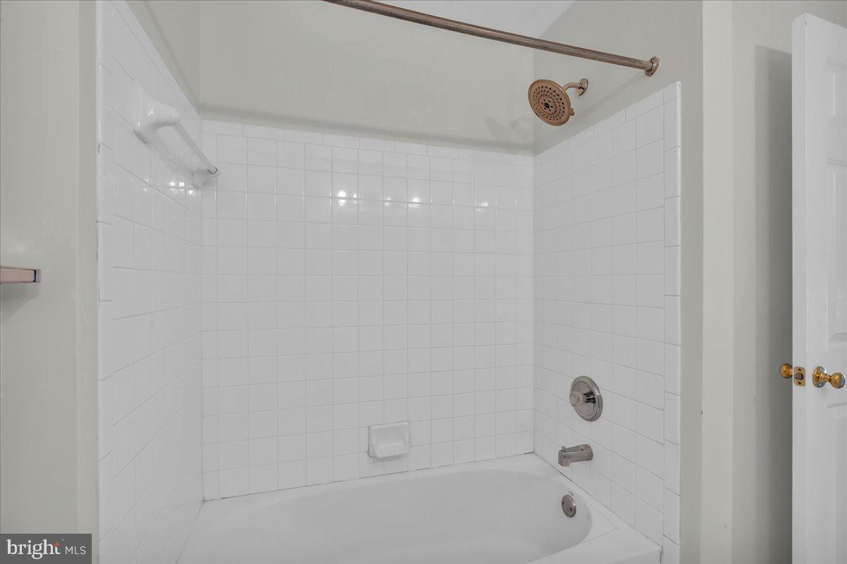 27 Golf View Court Pine Hill, NJ 08021 - Photo 17 of 33 a bathroom with a shower and a bathtub