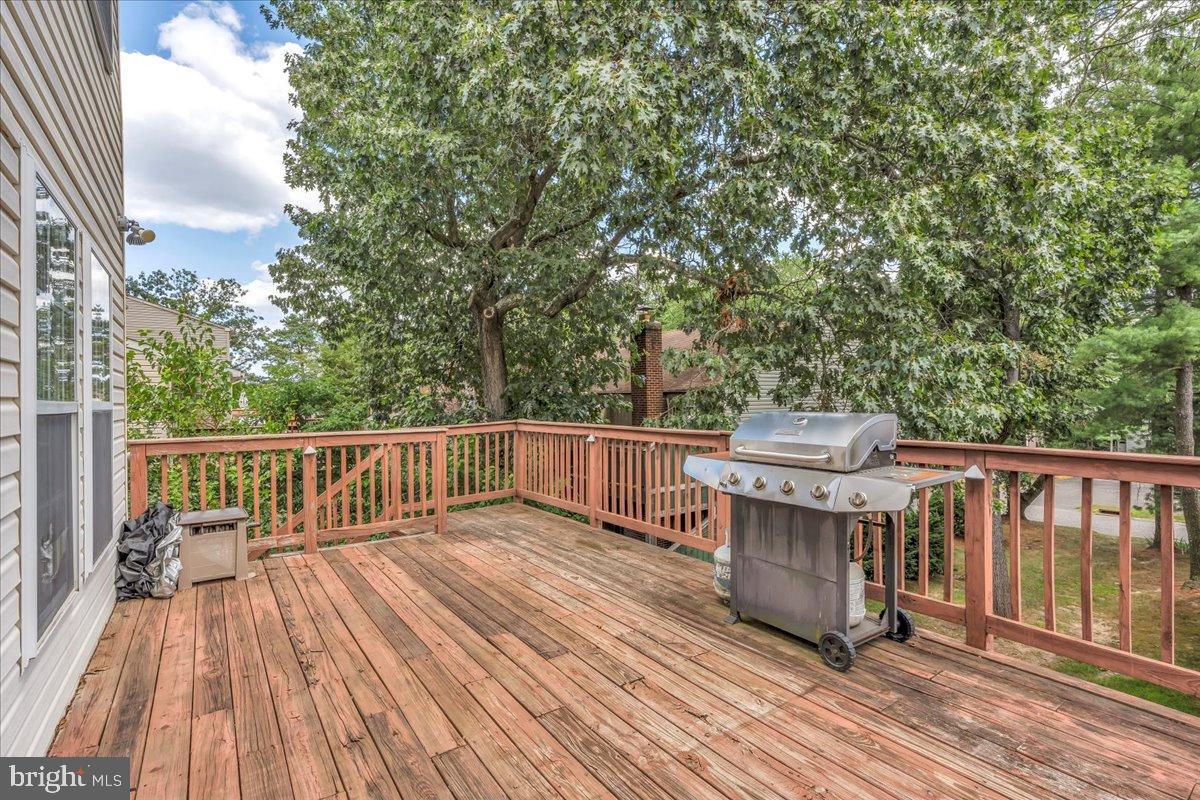 27 Golf View Court Pine Hill, NJ 08021 - Photo 23 of 33 a view of balcony with wooden floor and fence