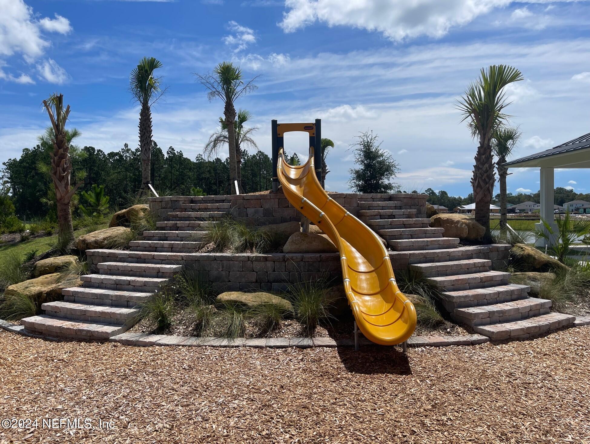 163 Harrow Cove St. Johns, FL 32259 - Photo 39 of 58 a view of a park with a slide