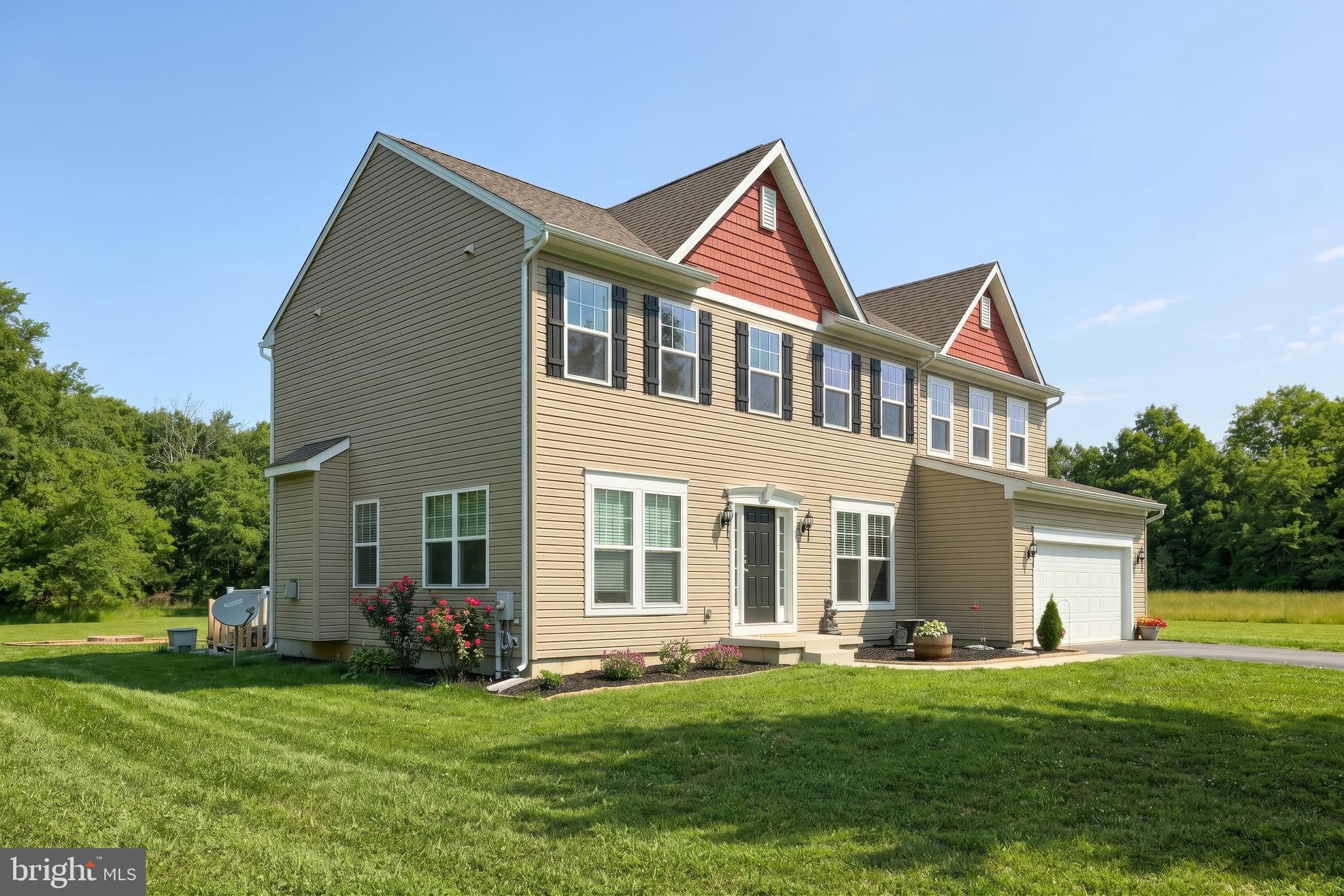 2741 Cold Springs Road Orrtanna, PA 17353 - Photo 8 of 52 a front view of a house with a garden