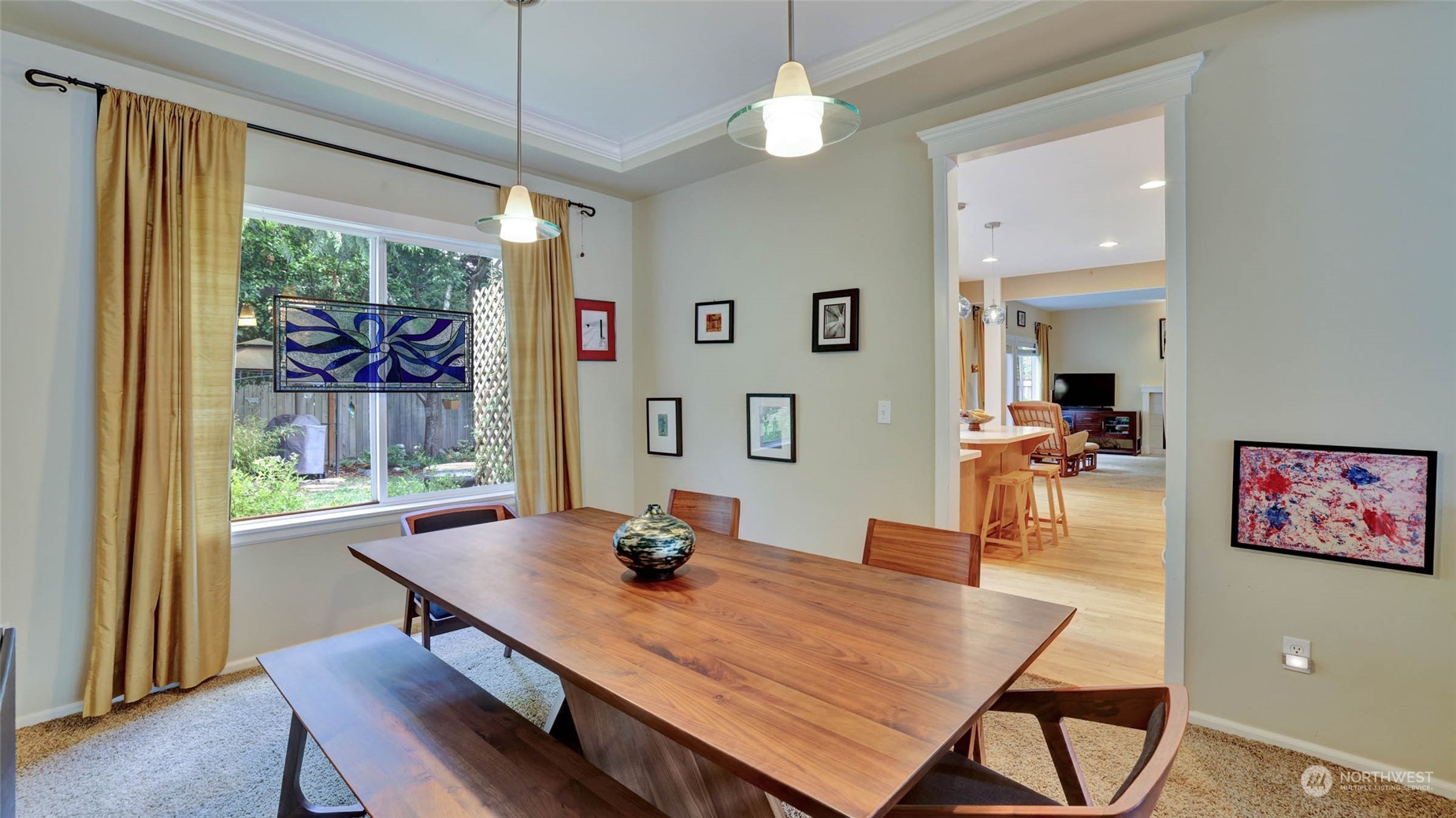 18609 173rd Way Southeast Renton, WA 98058 - Photo 11 of 37 a view of a dining room with furniture window and wooden floor