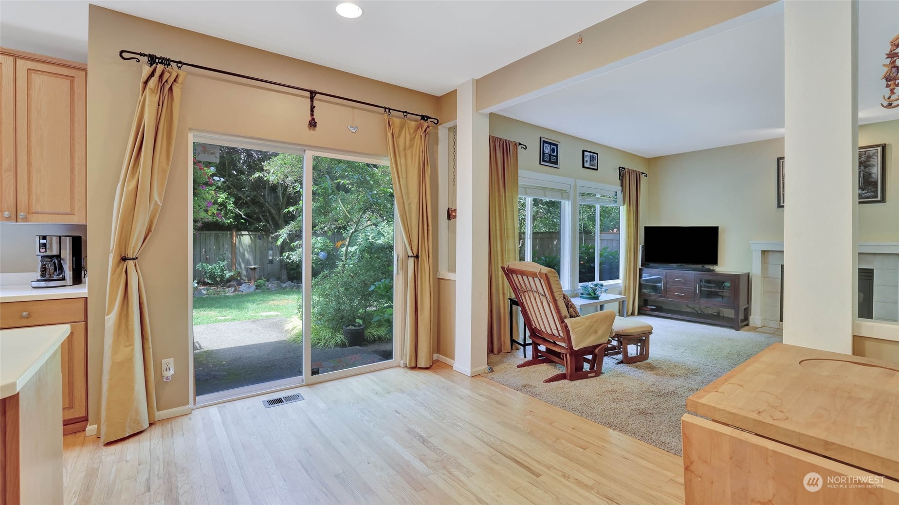 18609 173rd Way Southeast Renton, WA 98058 - Photo 17 of 37 a view of a livingroom with furniture and a flat screen tv