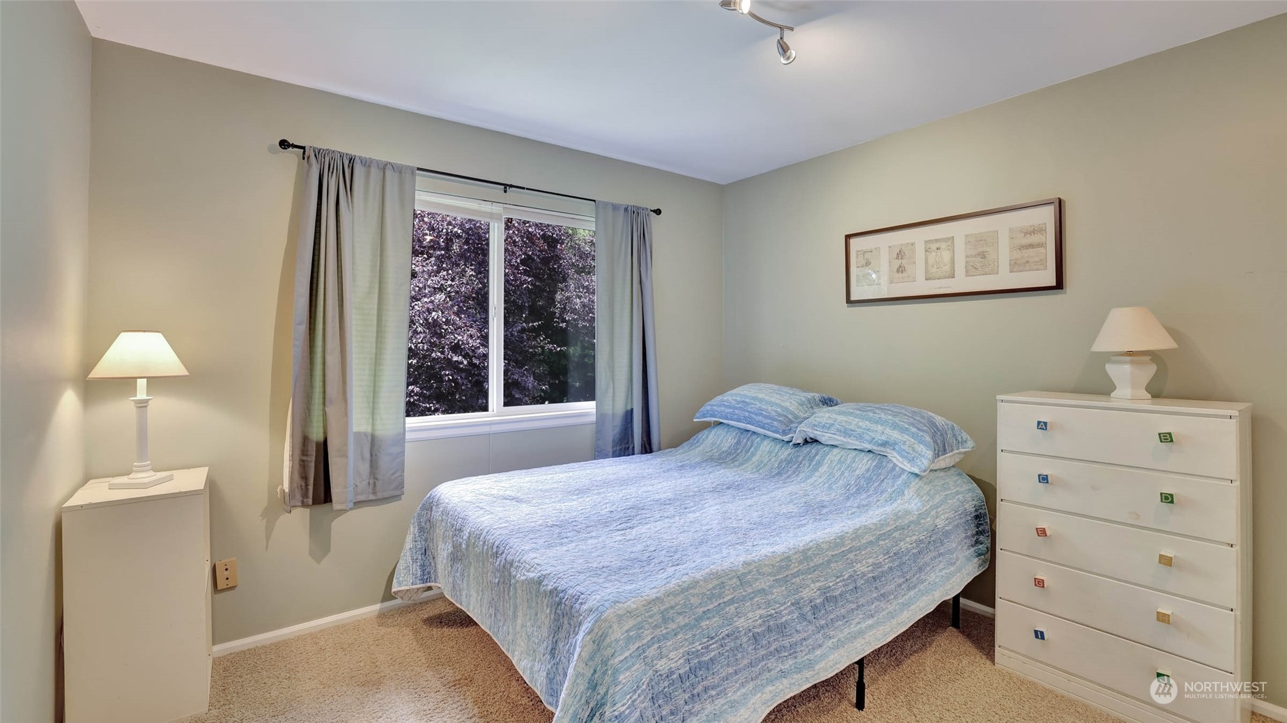 18609 173rd Way Southeast Renton, WA 98058 - Photo 21 of 37 a bedroom with a bed and a window