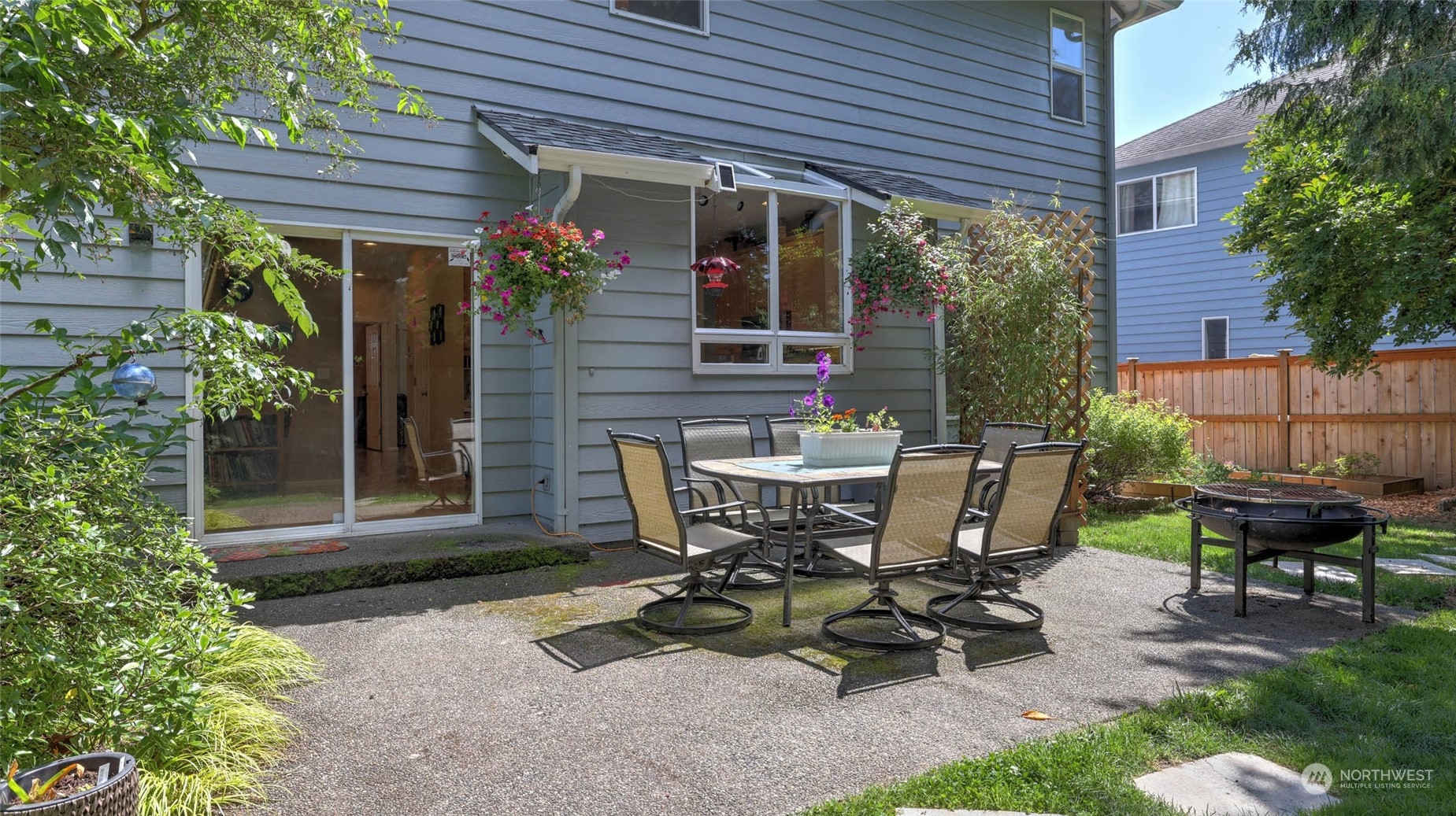 18609 173rd Way Southeast Renton, WA 98058 - Photo 31 of 37 a view of a chair and table in patio of the house