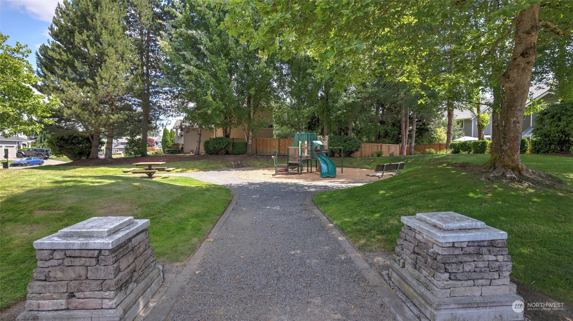 18609 173rd Way Southeast Renton, WA 98058 - Photo 36 of 37 a view of a park with bench and trees