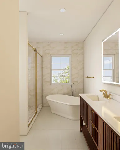 a bathroom with a sink a toilet and bathtub