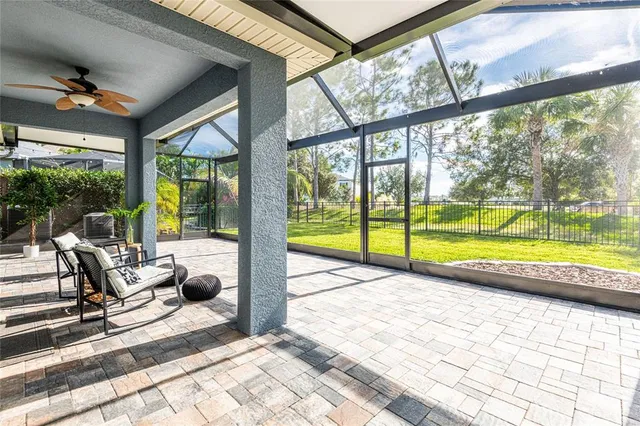 a view of swimming pool with patio