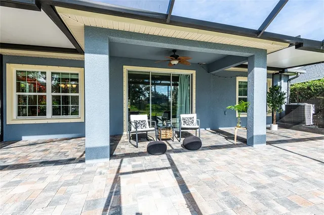 a view of a entryway door with outdoor seating
