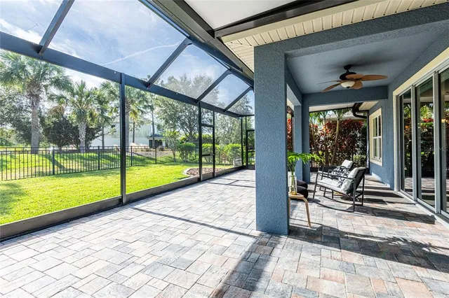 a view of a patio with a backyard