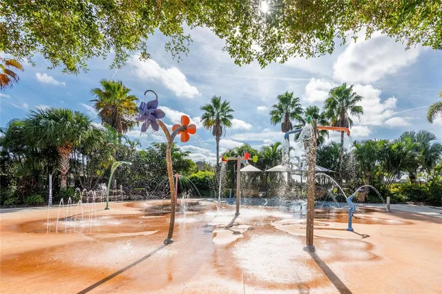 a view of a swimming pool with chairs
