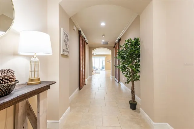 a view of hallway with furniture