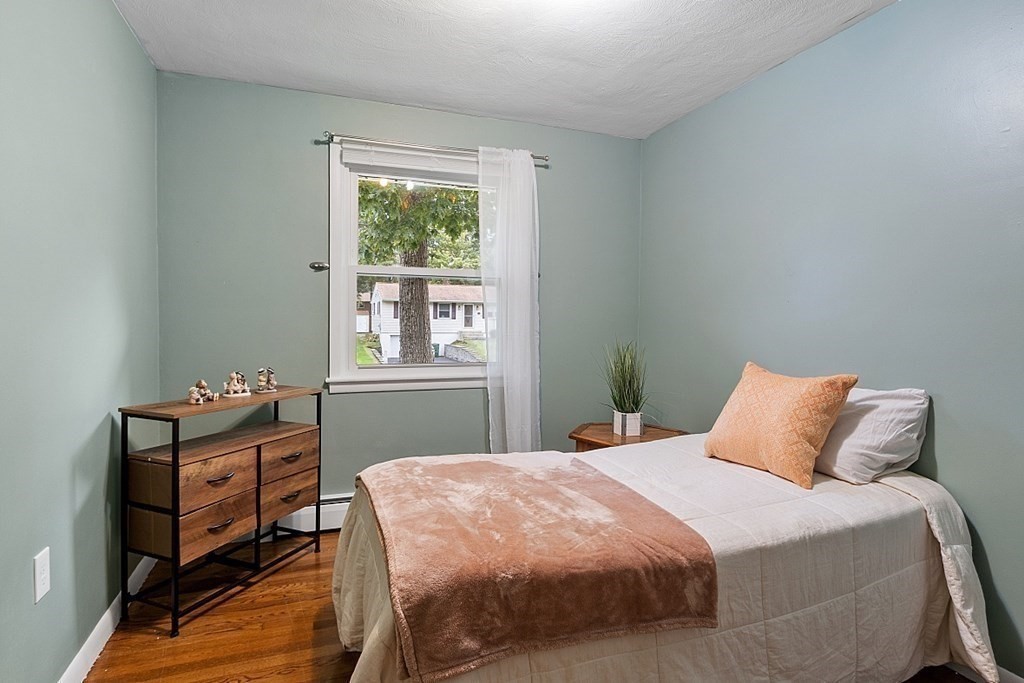 8 Anthony Drive Rutland, MA 01543 - Photo 18 of 30 a bedroom with a bed window and a dresser