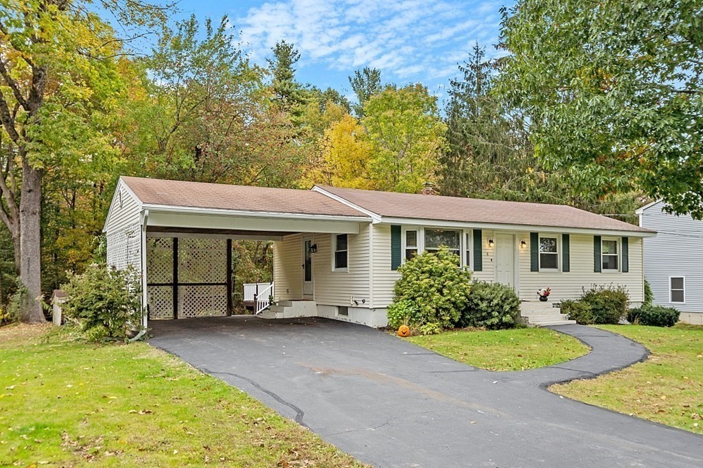 8 Anthony Drive Rutland, MA 01543 - Photo 27 of 30 a front view of a house with garden