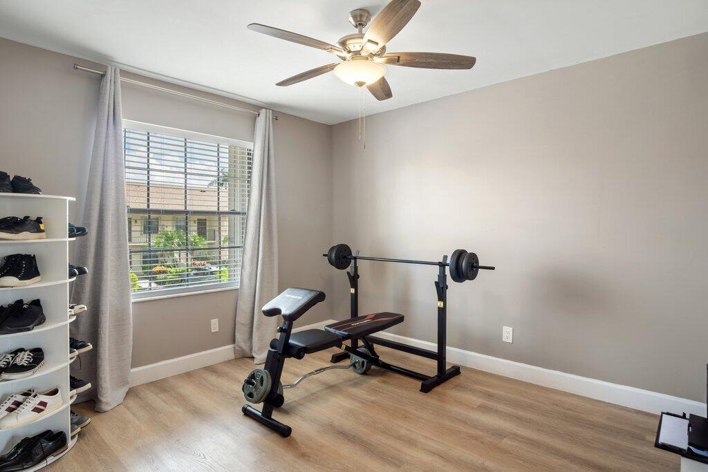 1402 Pinecrest Circle, Unit B Jupiter, FL 33458 - Photo 26 of 56 a view of a workspace with furniture and a window
