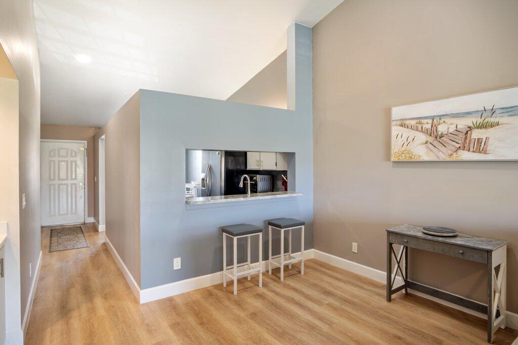 1402 Pinecrest Circle, Unit B Jupiter, FL 33458 - Photo 8 of 56 a view of livingroom with furniture and wooden floor