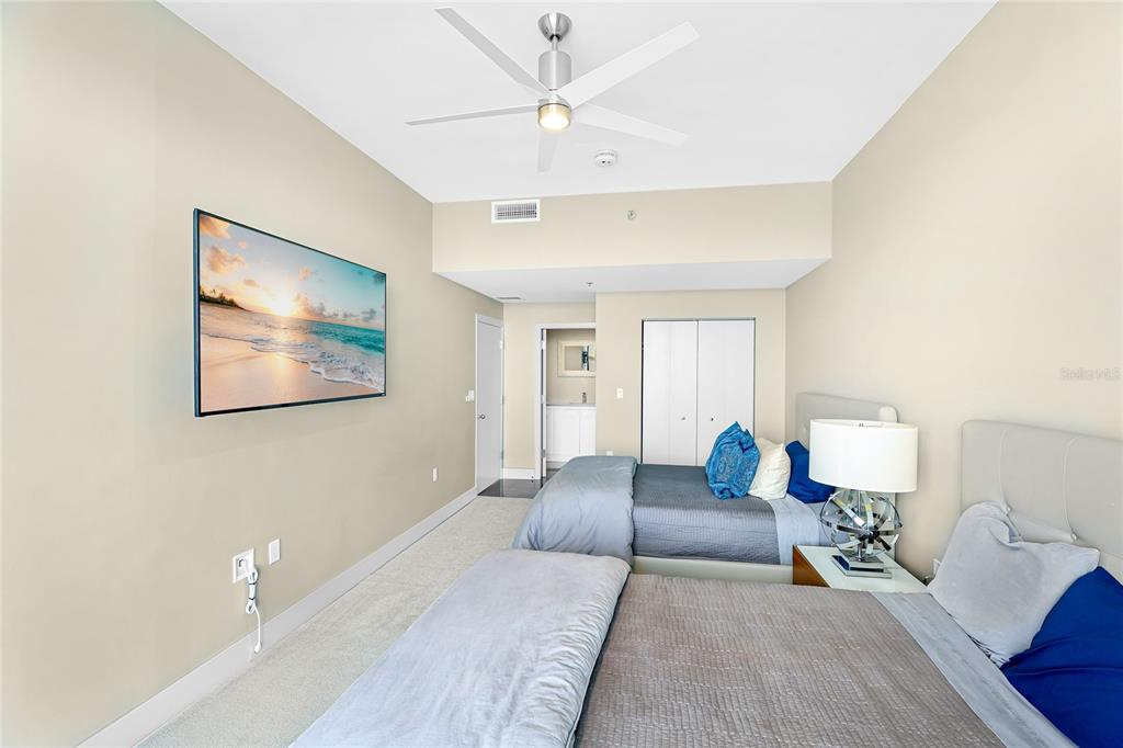 455 Longboat Club Road, Unit PH8 Longboat Key, FL 34228 - Photo 21 of 64 a bedroom with a bed and a couch