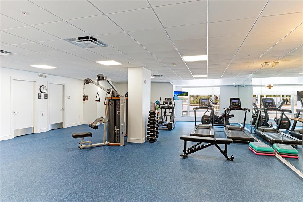 455 Longboat Club Road, Unit PH8 Longboat Key, FL 34228 - Photo 48 of 64 a view of a room with gym equipment