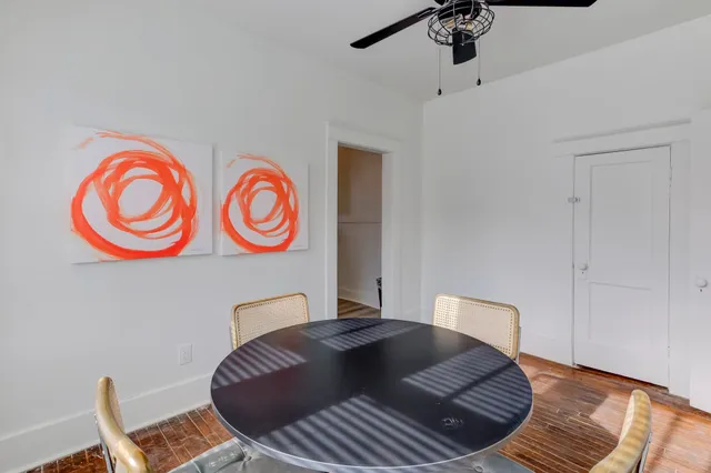 a kitchen with a sink stove top oven and cabinets
