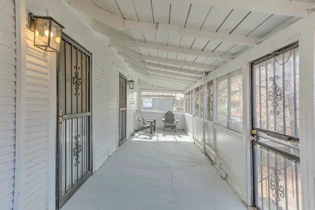 a view of a house with a street