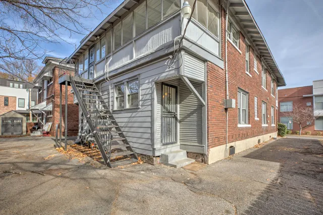 a view of a building with a street