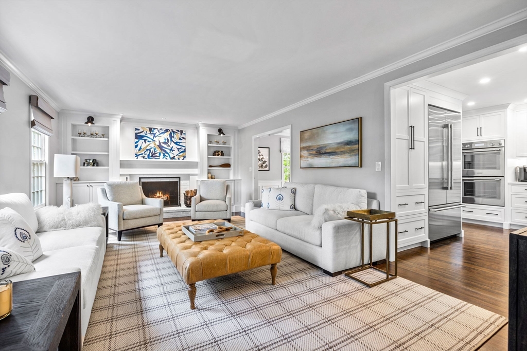 4 Alonesos Way Andover, MA 01810 - Photo 13 of 42 a living room with furniture large window and a fireplace