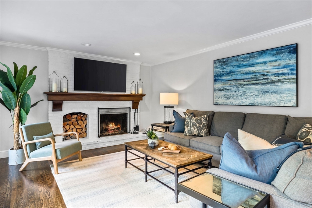 4 Alonesos Way Andover, MA 01810 - Photo 16 of 42 a living room with furniture and a fireplace