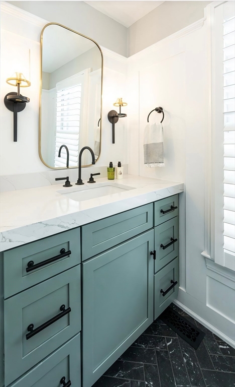 4 Alonesos Way Andover, MA 01810 - Photo 17 of 42 a bathroom with a sink and a mirror