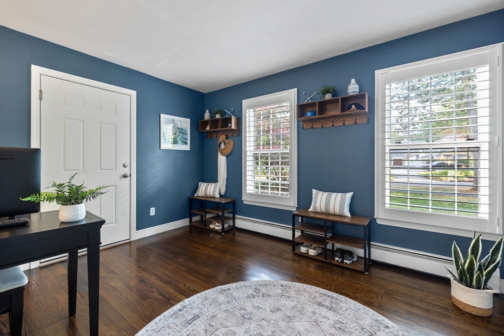 4 Alonesos Way Andover, MA 01810 - Photo 19 of 42 a living room with furniture and a potted plant