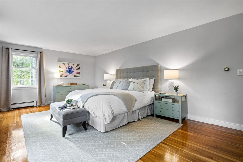 4 Alonesos Way Andover, MA 01810 - Photo 20 of 42 a bed room with a bed and a couch