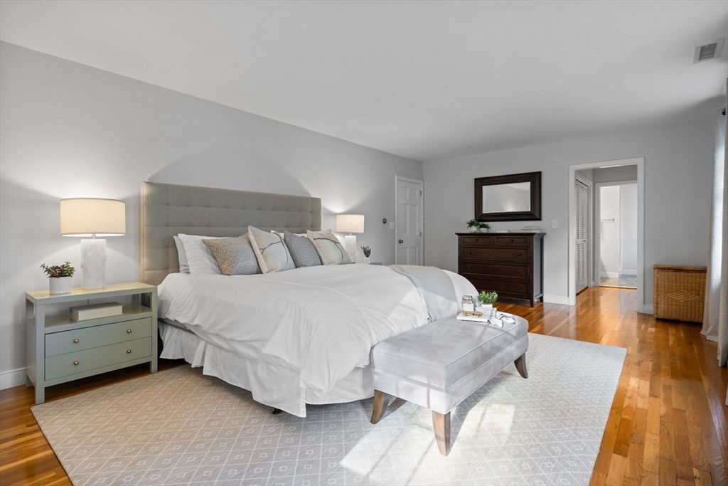 4 Alonesos Way Andover, MA 01810 - Photo 22 of 42 a bedroom with a bed and a couch