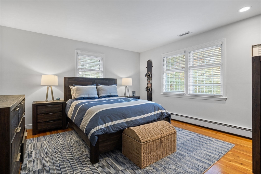 4 Alonesos Way Andover, MA 01810 - Photo 31 of 42 a bedroom with bed and wooden floor