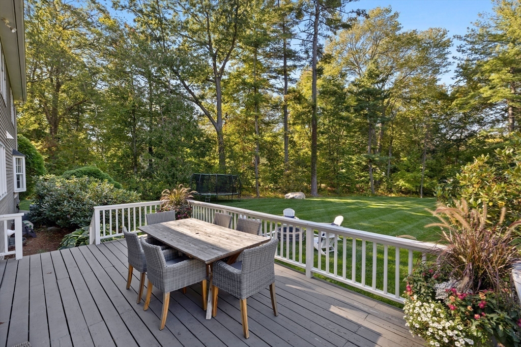 4 Alonesos Way Andover, MA 01810 - Photo 36 of 42 a view of a deck with a table and chairs