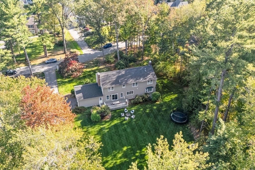 4 Alonesos Way Andover, MA 01810 - Photo 38 of 42 an aerial view of a house with a yard and garden