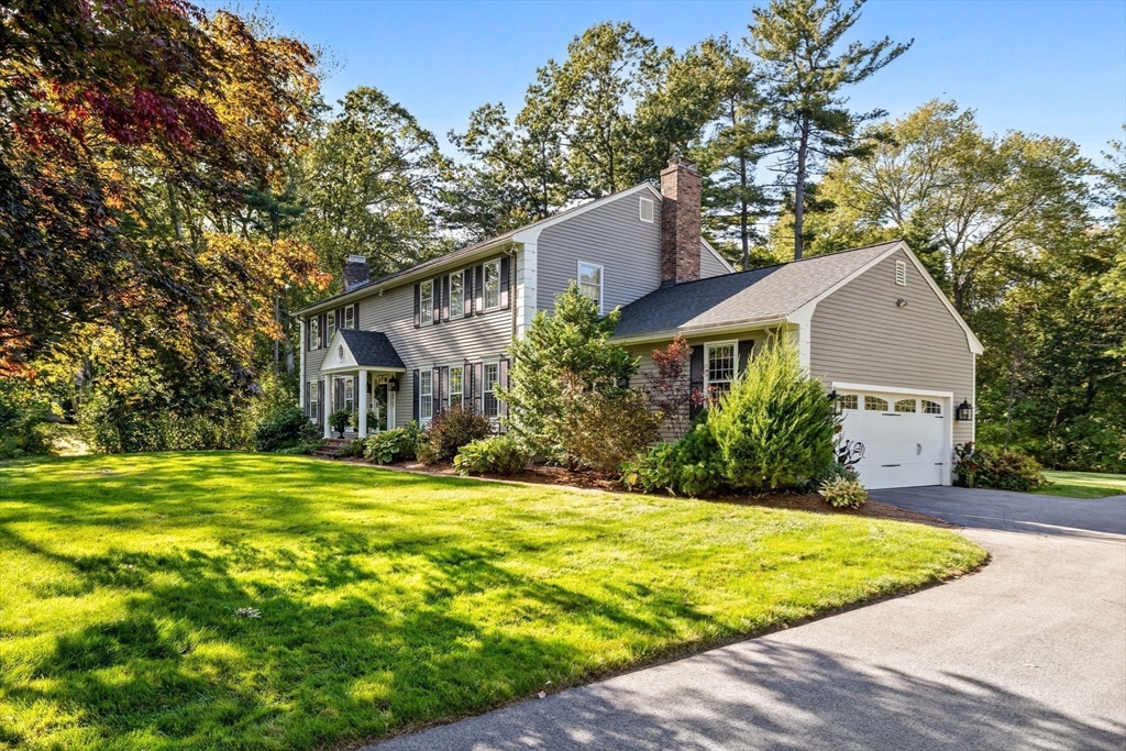 4 Alonesos Way Andover, MA 01810 - Photo 42 of 42 a front view of a house with a yard