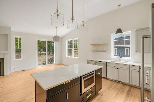 a bathroom with a toilet sink and shower