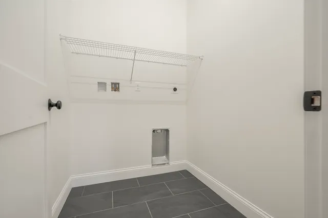 a view of a lake with houses in the back