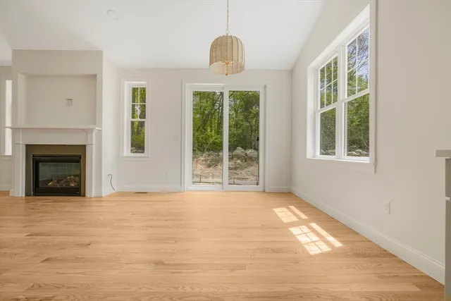 a kitchen with kitchen island a counter top space a sink and cabinets
