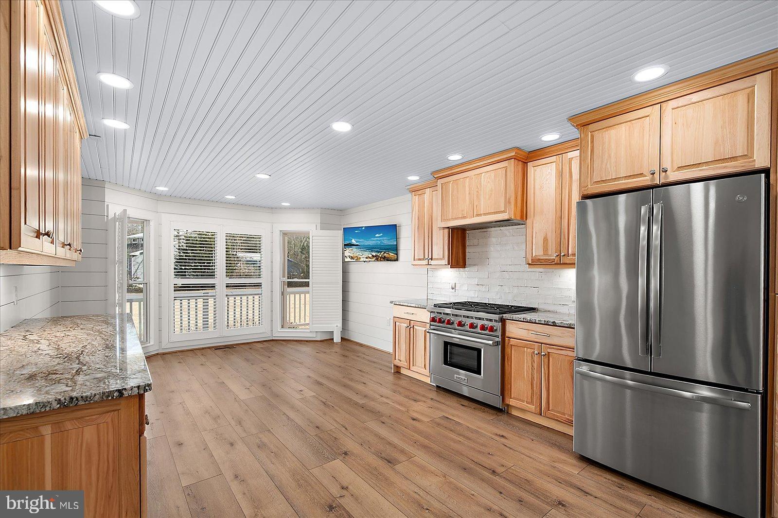 32271 West Road Frankford, DE 19945 - Photo 12 of 56 Granite counters & breakfast bar.