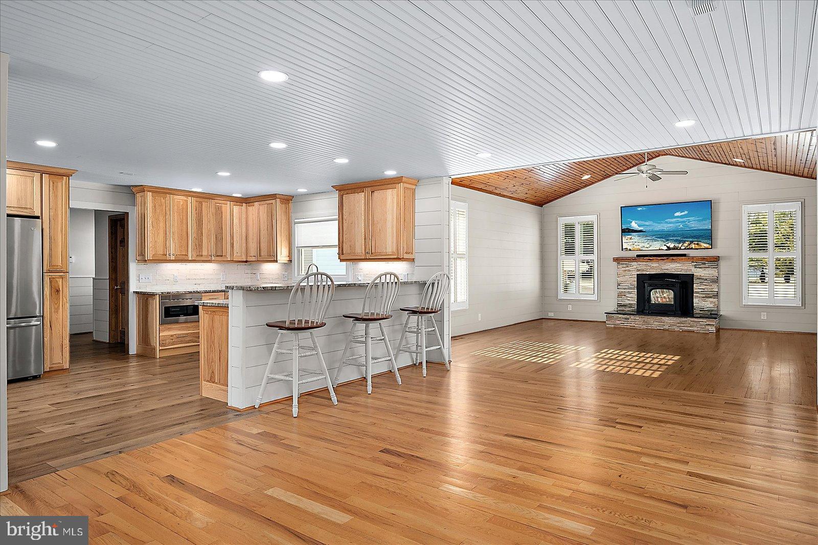 32271 West Road Frankford, DE 19945 - Photo 14 of 56 Spacious living area with warm wood accents.