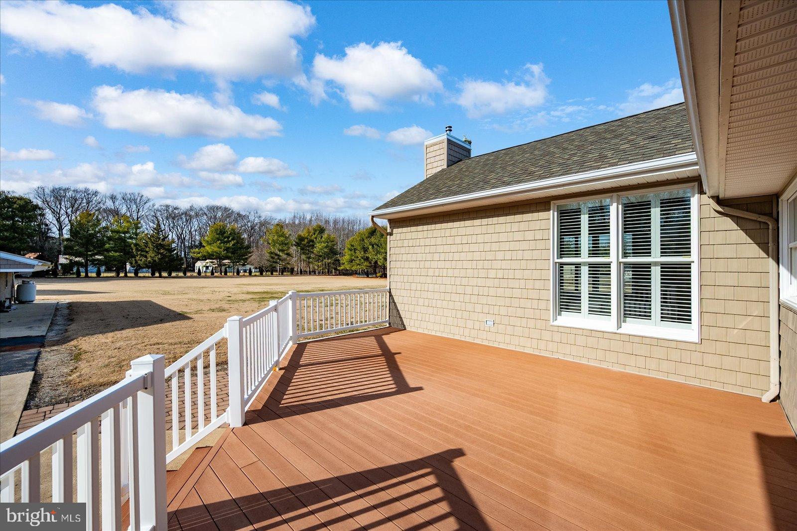 32271 West Road Frankford, DE 19945 - Photo 33 of 56 Spacious deck with serene outdoor views.