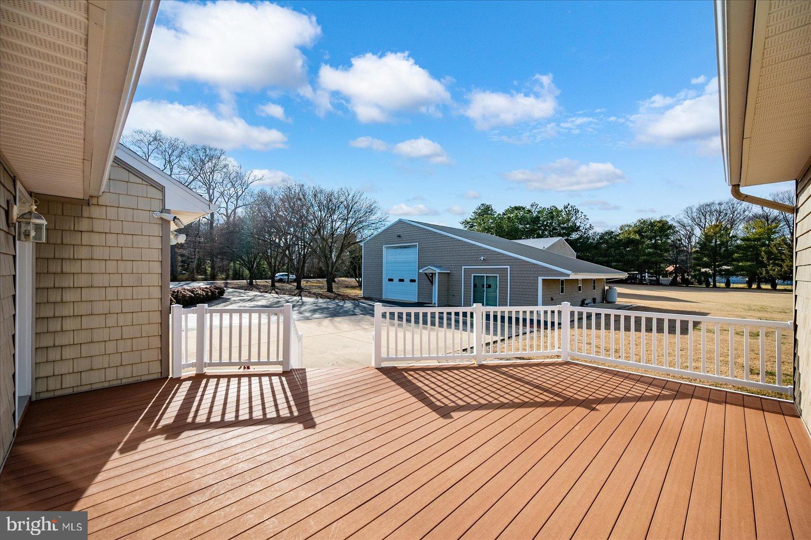32271 West Road Frankford, DE 19945 - Photo 34 of 56 Sunny deck with expansive outdoor views.