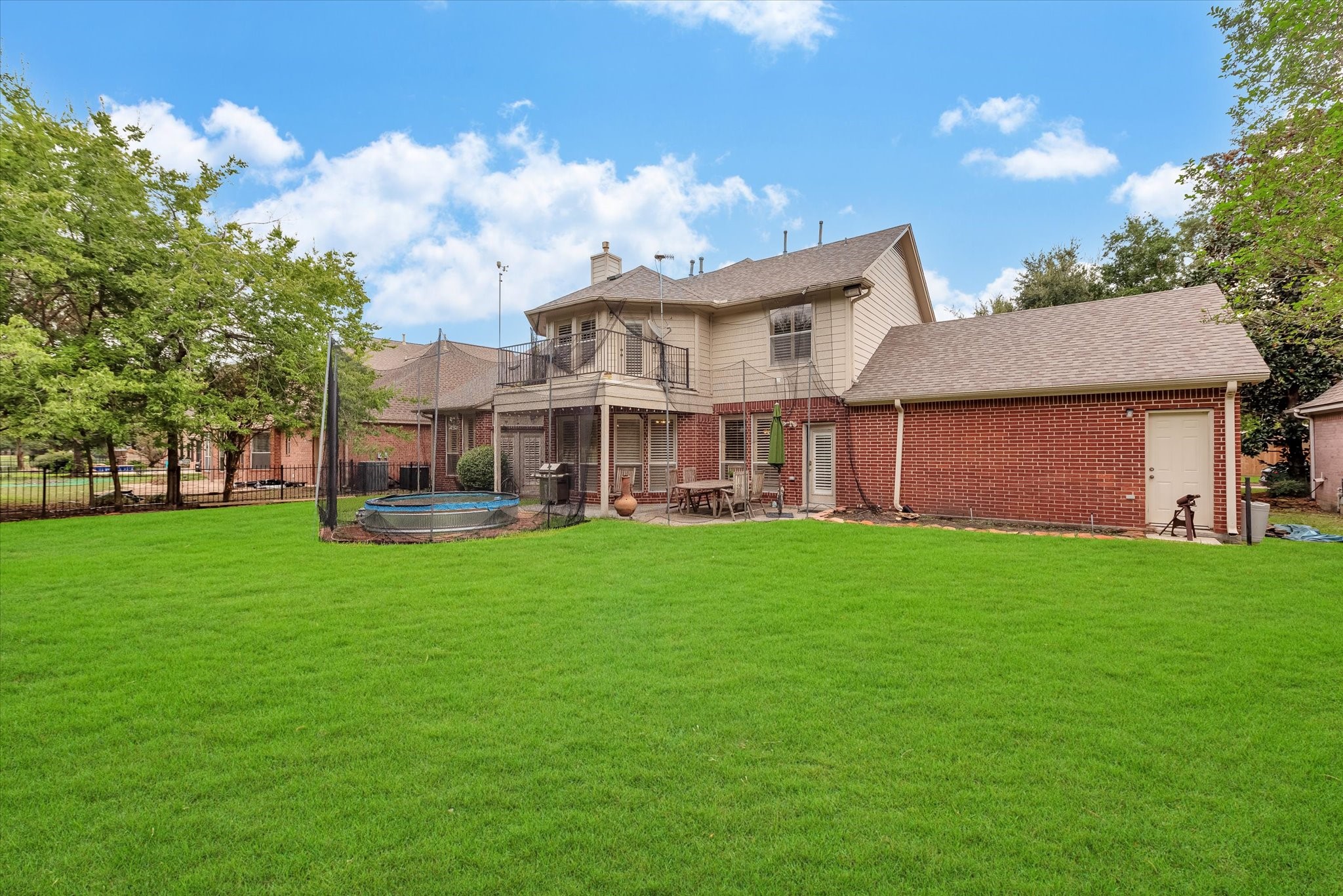 5718 Oakmoss Trail Spring, TX 77379 - Photo 44 of 50 Experience tranquility with lush greens and open fairways—ideal for morning coffee and stunning sunsets.