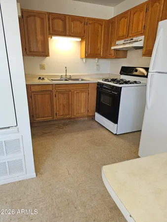 a room with a table and chairs