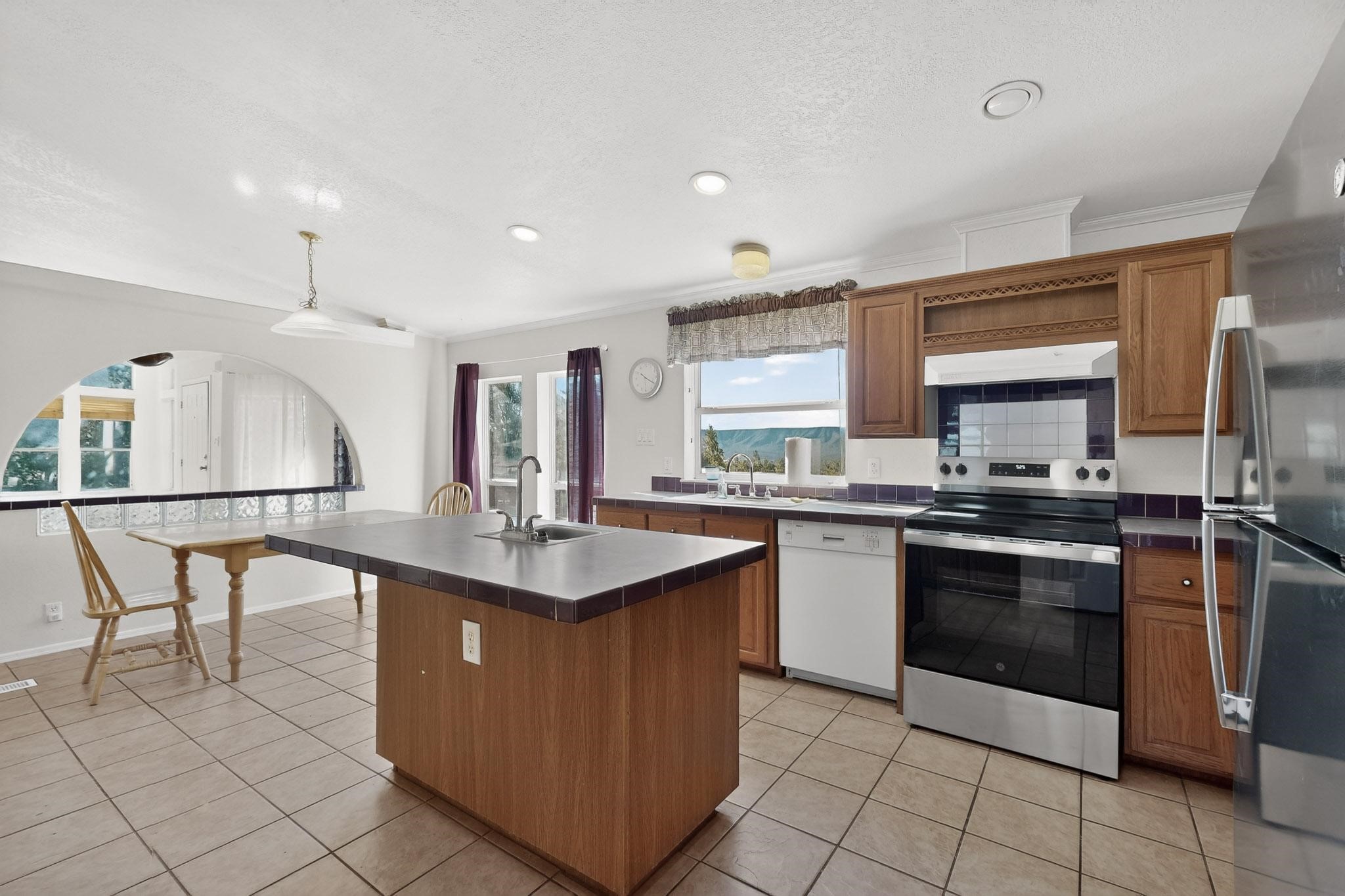 103 Hidden Valley Ranch Road Ilfeld, NM 87538 - Photo 13 of 49 Kitchen looking to dining