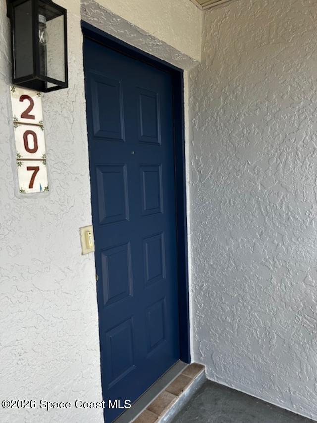 1720 Murrell Road, Unit 207 Rockledge, FL 32955 - Photo 2 of 17 New paint color front door