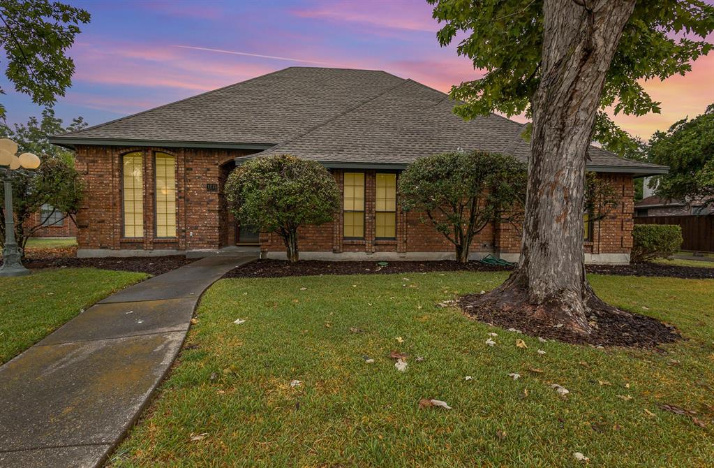 1215 Poplar Lane Lancaster, TX 75146 - Photo 1 of 1 a front view of a house with garden